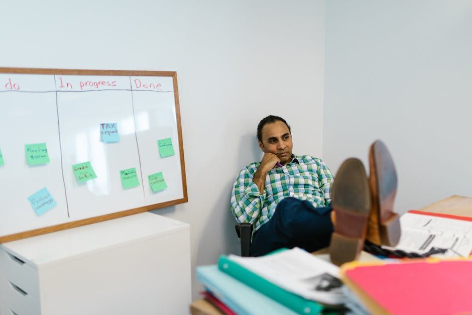 Small business team planning tasks on a digital whiteboard