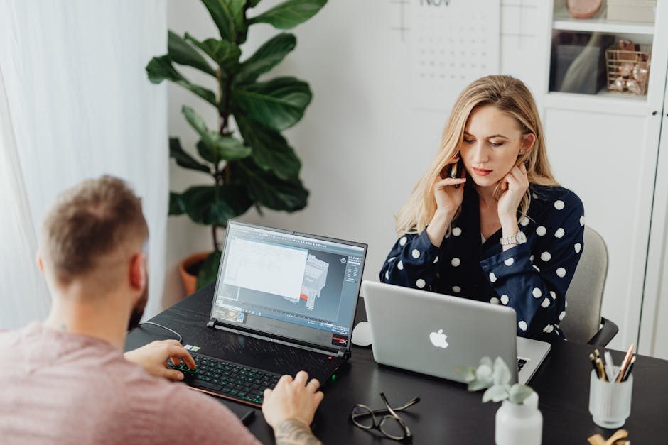 Diverse team having a video meeting around a conference table