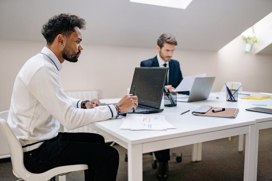 Business professional reviewing compliance checklist on tablet with checkmarks, representing automated compliance workflows.